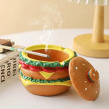 Cendrier cheeseburger avec une cigarette et le couvercle ouvert