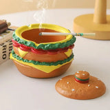 Cendrier cheeseburger ouvert avec un mégot