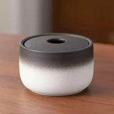 Cendrier Fermé Maison sur une table